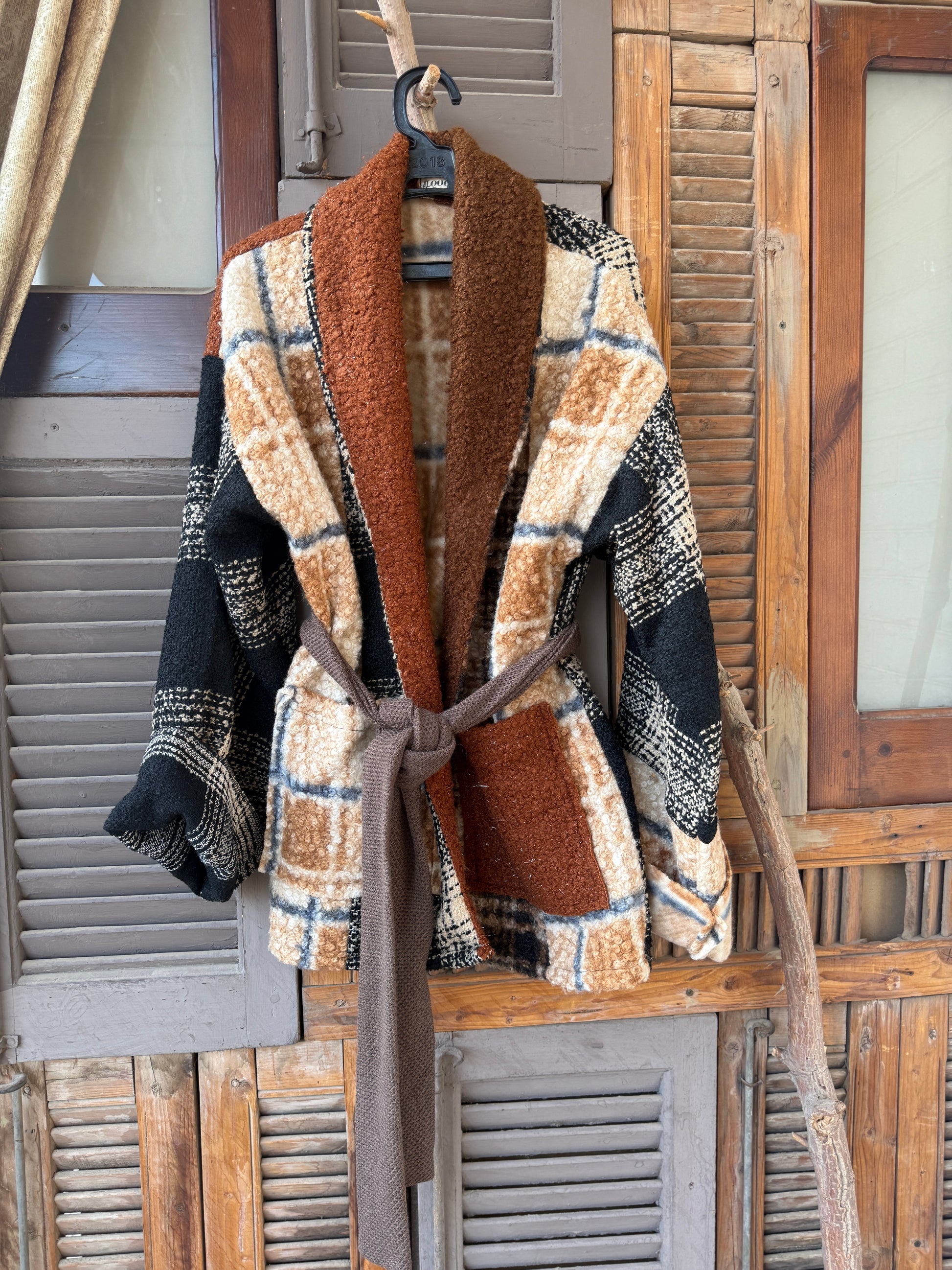 Patched jacket in earth tones