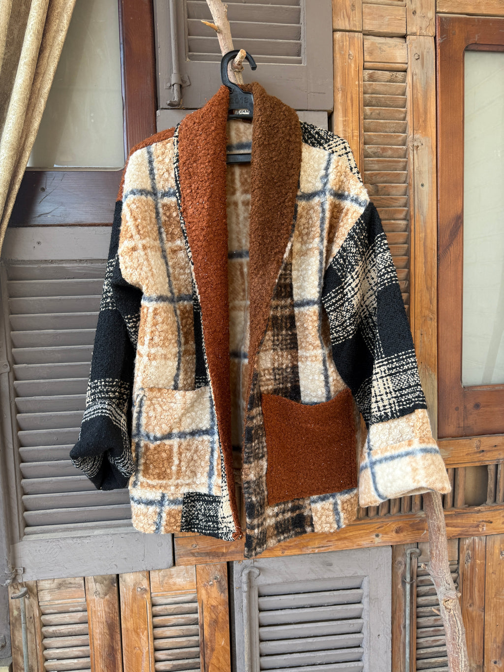 Patched jacket in earth tones