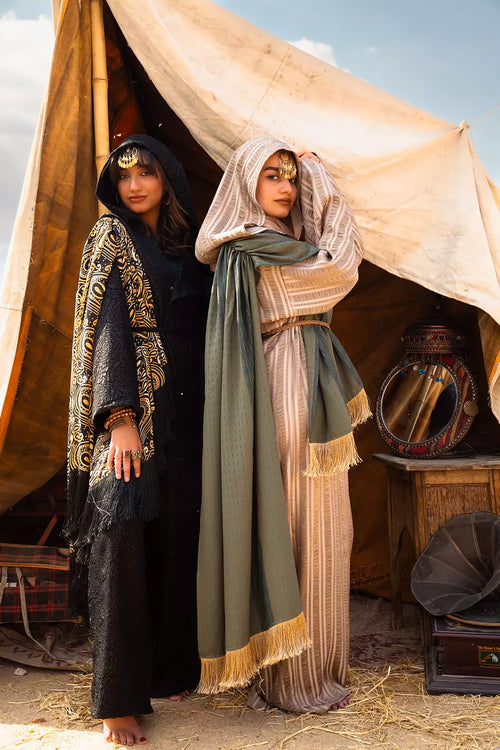 Black jumpsuit with gold shawl